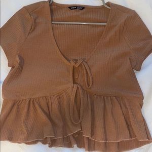 brown top that ties in the middle